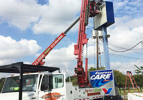 city signs installing business signage